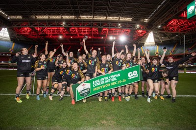 120426 - Llandaff North v Bonymaen - Womens Cup Final - Cerys Sweetman lifts the trophy alongside team mates