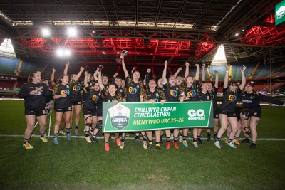 120426 - Llandaff North v Bonymaen - Womens Cup Final - Cerys Sweetman lifts the trophy alongside team mates
