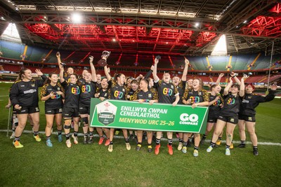 120426 - Llandaff North v Bonymaen - Womens Cup Final - Cerys Sweetman lifts the trophy alongside team mates