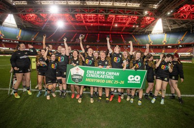 120426 - Llandaff North v Bonymaen - Womens Cup Final - Cerys Sweetman lifts the trophy alongside team mates