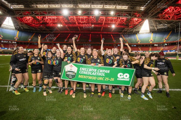 120426 - Llandaff North v Bonymaen - Womens Cup Final - Cerys Sweetman lifts the trophy alongside team mates