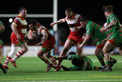 200325 - Llandovery RFC v Ebbw Vale - Super Rygbi Cymru Final - Rhodri Jones of Llandovery is tackled by Joe Franchi of Ebbw Vale 