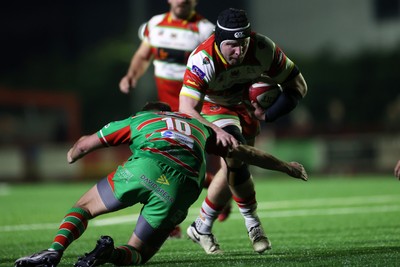 200325 - Llandovery RFC v Ebbw Vale - Super Rygbi Cymru Final - Nathan Hart of Llandovery is tackled by Evan Lloyd of Ebbw Vale 