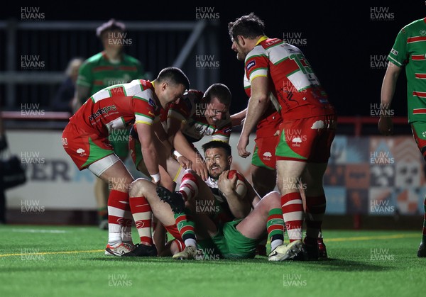 200325 - Llandovery RFC v Ebbw Vale - Super Rygbi Cymru Final - Lee Rees of Llandovery celebrates scoring a try with team mates