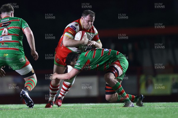 200325 - Llandovery RFC v Ebbw Vale - Super Rygbi Cymru Final - Berian Watkins of Llandovery is tackled by Curtis Gregory of Ebbw Vale 