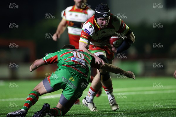 200325 - Llandovery RFC v Ebbw Vale - Super Rygbi Cymru Final - Nathan Hart of Llandovery is tackled by Evan Lloyd of Ebbw Vale 