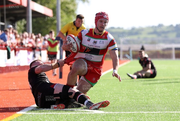 030525 - Llandovery RFC v Pontypool RFC - Super Rygbi Cymru Quarter Final - Harri Doel of Llandovery is tackled by Ioan Duggan of Pontypool 