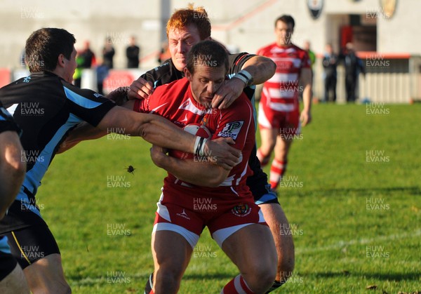 13.11.10. Llandovery v Cardiff- Principality Premiership. Dean Fitzgerald of Llandovery runs into trouble 