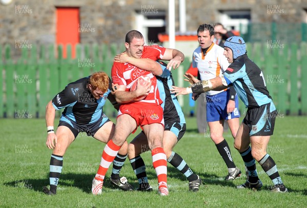 13.11.10. Llandovery v Cardiff- Principality Premiership. Marc DeMarigny of Llandovery struggles with the Cardiff defence. 