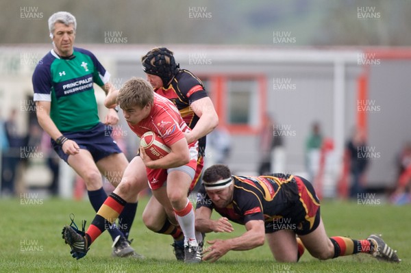 070412 -  Llandovery RFC v Carmarthen Quins RFC - Principality Premiership - Llandovery RFC's Jack Roberts is tackled by  Carmarthen Quins' Sion Bennet