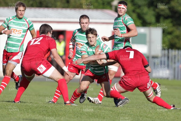 061012 - Llandovery v Llanelli - Welsh Premiership - Llandovery's Lee Rees runs into the Llanelli defence