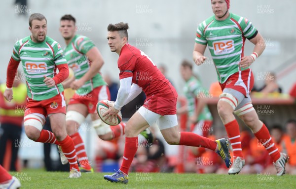 110513 - Llandovery v Llanelli - Principality Premiership Play Off -Jordan Williams of Llanelli gets the ball away 