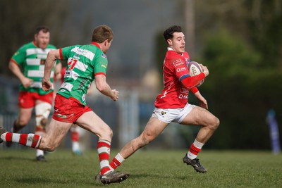 250323 - Llandovery v Llanelli - Indigo Group Premiership - Jac Davies of Llanelli on the attack