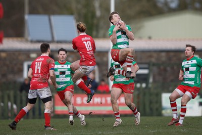 250323 - Llandovery v Llanelli - Indigo Group Premiership - Rhodri Wall of Llandovery takes a high ball