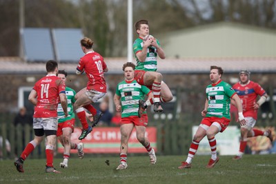 250323 - Llandovery v Llanelli - Indigo Group Premiership - Rhodri Wall of Llandovery takes a high ball