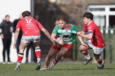 250323 - Llandovery v Llanelli - Indigo Group Premiership - Macs Page of Llandovery runs out of defence