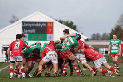 250323 - Llandovery v Llanelli - Indigo Group Premiership - Players compete for the ball at a maul