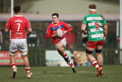 250323 - Llandovery v Llanelli - Indigo Group Premiership - Jac Davies of Llanelli counterattacks