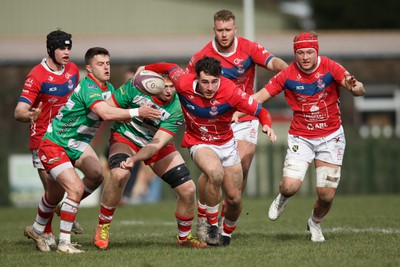 250323 - Llandovery v Llanelli - Indigo Group Premiership - Jac Davies of Llanelli on the attack