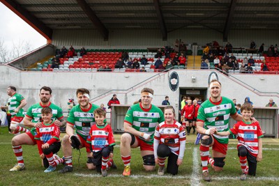 250323 - Llandovery v Llanelli - Indigo Group Premiership - Players kneel