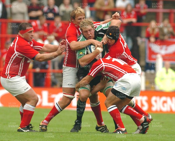 170905 - Llanelli Scarlets 25 v 17 Connacht - Celtic League -  Connacht's Andrew Farley is smothered by the Scarlets