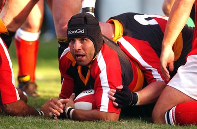 060903 - Llanelli Scarlets v Newport Gwent Dragons - Celtic League - Dragons' Jason Forster scores try