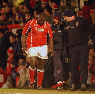 040203 - Llanelli v Cardiff - Welsh Premiership - Llanelli's Martyn Madden leaves the field injured