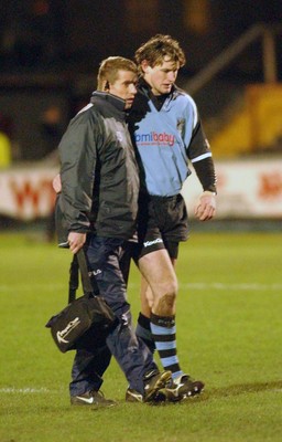 040203 - Llanelli v Cardiff - Welsh Premiership - Cardiff's Jamie Robinson leaves the field injured