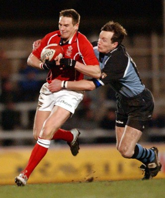 040203 - Llanelli v Cardiff - Welsh Premiership - Llanelli's Matthew J Watkins is caught by Nick Walne