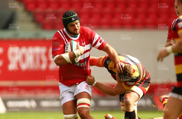 260817 - Llanelli RFC v Carmarthen Quins RFC - Principality Premiership - West Section - Tom Price of Llanelli is tackled by Lawrence Reynolds of Carmarthen Quins 