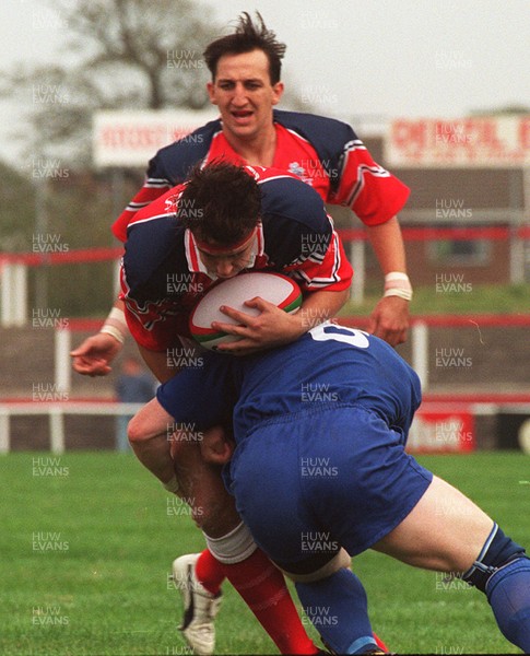 121096 - Llanelli v Leinster - Hywel Jenkins of Llanelli is tackled by Chris Pim