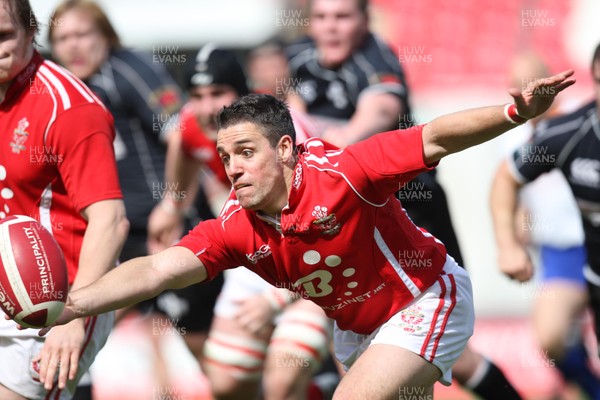 02.05.09 - Llanelli v Neath, Principality Premiership -  Llanelli's Luke Richards juggles with the ball as he tries to break away 