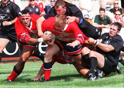 160897 - Llanelli v Neath - Steve Ford drives froward to score a try with support from Chris Wyatt