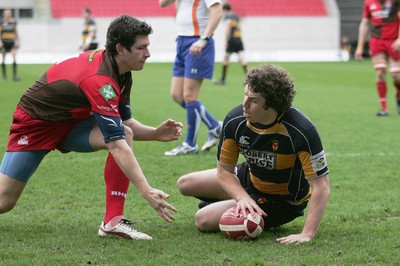 03.04.10 Llanelli RFC v Newport RFC - Principality Premiership - Newport's Richard Payne slides in to score the first try of the afternoon. 