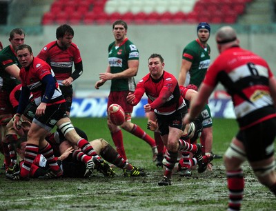 04.02.12. Llanelli RFC v Pontypool RFC, Principality Premiership..Pontypool scrum half Calwyn Morgan clears the ball..