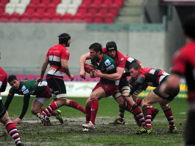 04.02.12. Llanelli RFC v Pontypool RFC, Principality Premiership..Llanelli's Johnny Lewis struggles for possession..