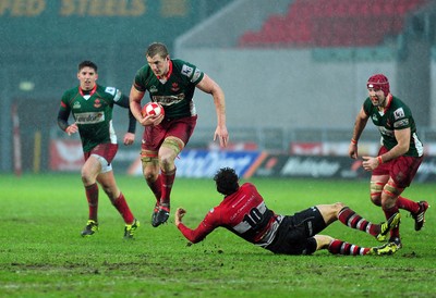 04.02.12. Llanelli RFC v Pontypool RFC, Principality Premiership..Llanelli's Craig Price charges through the Pontypool defence..