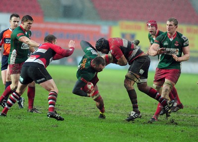 04.02.12. Llanelli RFC v Pontypool RFC, Principality Premiership..Llanelli's Allan Powell is brought down..