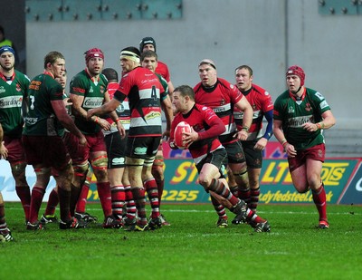 04.02.12. Llanelli RFC v Pontypool RFC, Principality Premiership..Pontypool scrum half Calwyn Morgan takes the ball..