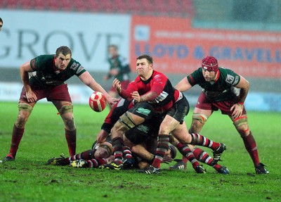 04.02.12. Llanelli RFC v Pontypool RFC, Principality Premiership..Pontypool scrum half Calwyn Morgan clears the ball..