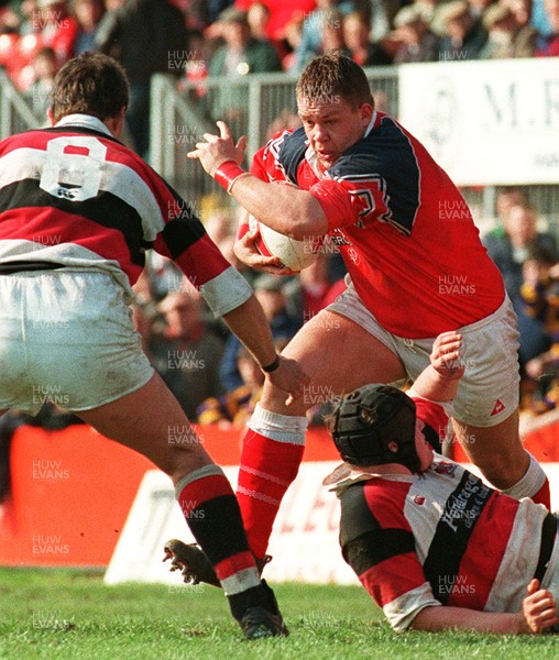 220397 - Llanelli v Pontypool - Spencer John of Llanelli takes on Chris West