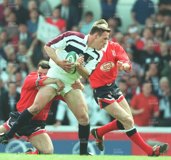 150599 - Llanelli v Swansea - SWALEC Cup Final -  Swansea's Mark Taylor is caught by Byron Hayward