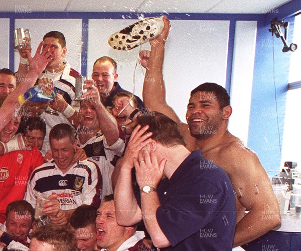 150599 - Llanelli v Swansea - SWALEC Cup Final -  Swansea's Colin Charvis celebrates with team