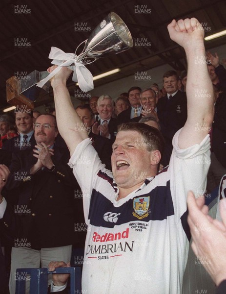 150599 - Llanelli v Swansea - SWALEC Cup Final -  Swansea captain Scott Gibbs celebrates with the trophy