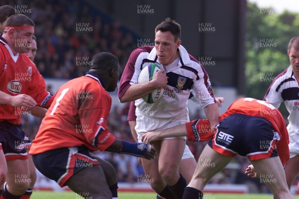 150599 - Llanelli v Swansea - SWALEC Cup Final -  Swansea's Mark Taylor takes on Martyn Madden