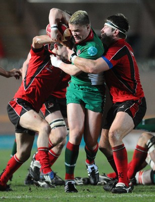 12.02.10 - British and Irish Cup rugby, Llanelli RFC v Ulster A Llanelli's Tavis Knoyle tries to get through 