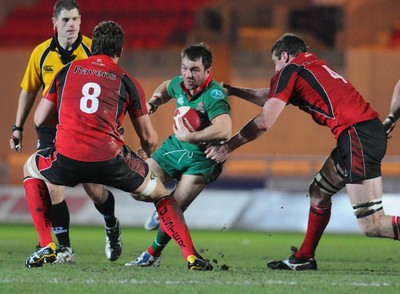 12.02.10 - British and Irish Cup rugby, Llanelli RFC v Ulster A Llanelli's Craig Hawkins tries to get through 