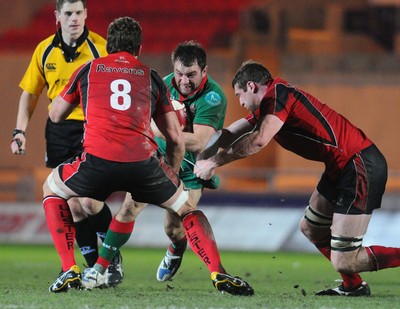 12.02.10 - British and Irish Cup rugby, Llanelli RFC v Ulster A Llanelli's Craig Hawkins tries to get through 