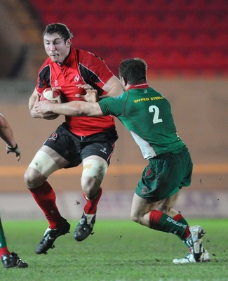 12.02.10 - British and Irish Cup rugby, Llanelli RFC v Ulster A Ulster's Ed O'Donoghue tries to get through 