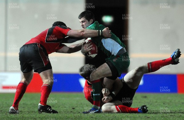 12.02.10 - British and Irish Cup rugby, Llanelli RFC v Ulster A Llanelli's Jonny Lewis is stopped 